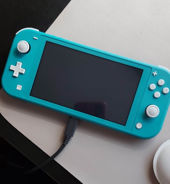 Nintendo Switch Lite Hyrule Edition + 12 Monate Nintendo Switch